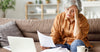 an-old-woman-holds-a-piece-of-paper