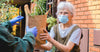 an-elderly-woman-receiving-food
