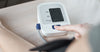 a-person-taking-blood-pressure-measurement