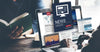 businessman-viewing-news-update-journalism-headline-on-a-laptop